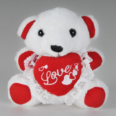 Gevulde het Speelgoedteddybeer van maniervalentijnskaarten Dag met het Rode Hartduw Vieren