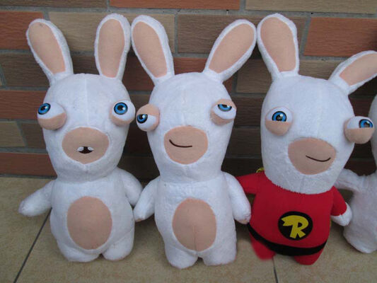 Mooie Rayman die Rabbids-het Speelgoed Witte Leuke Douane ijlt van de Beeldverhaalpluche